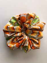 Load image into Gallery viewer, Large Hair Scrunchie with attachable bunny ears bow, Kaffe Fassett fabric, Cool Garlands Tawny